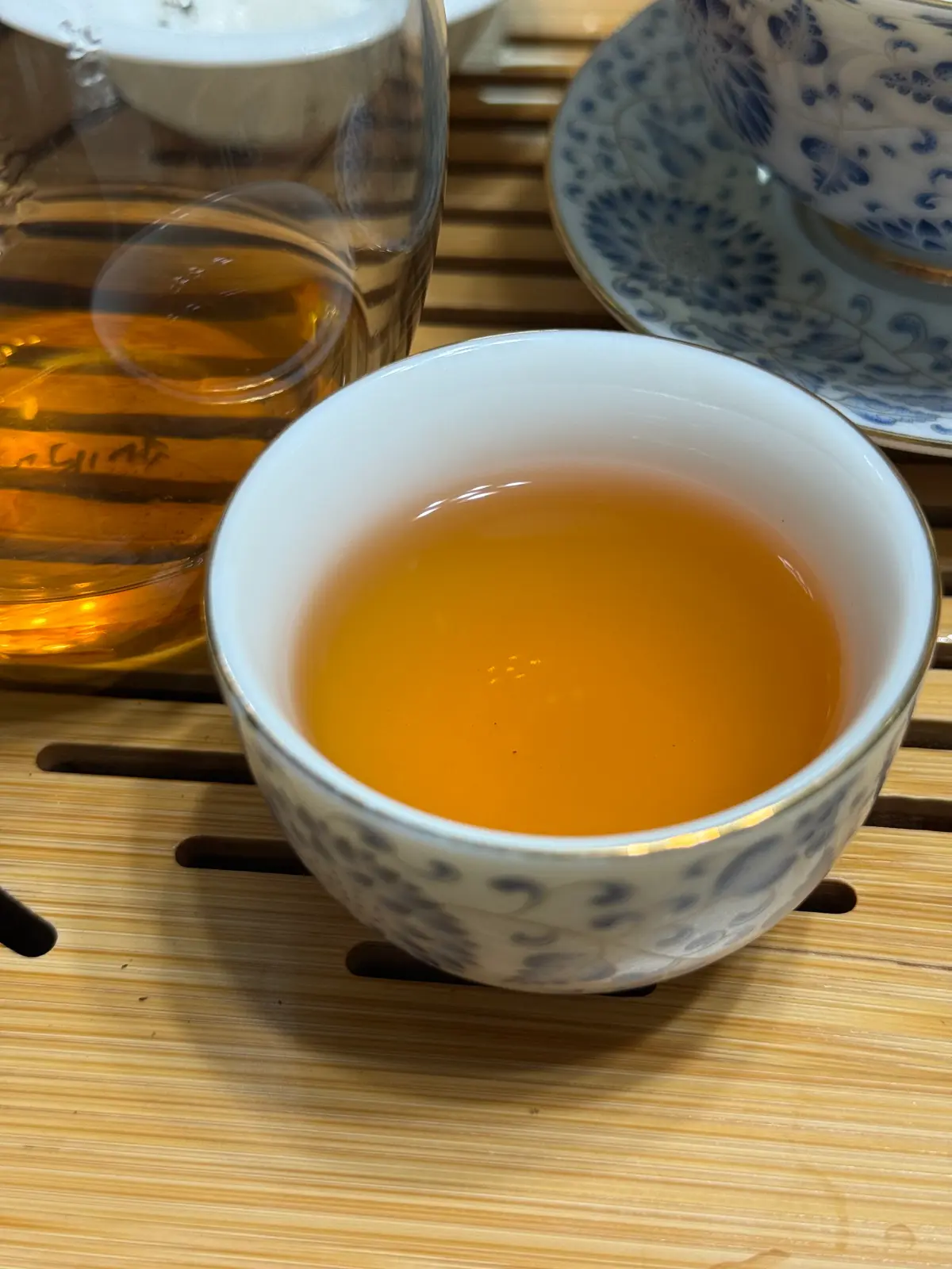 Early steep — pale amber liquor