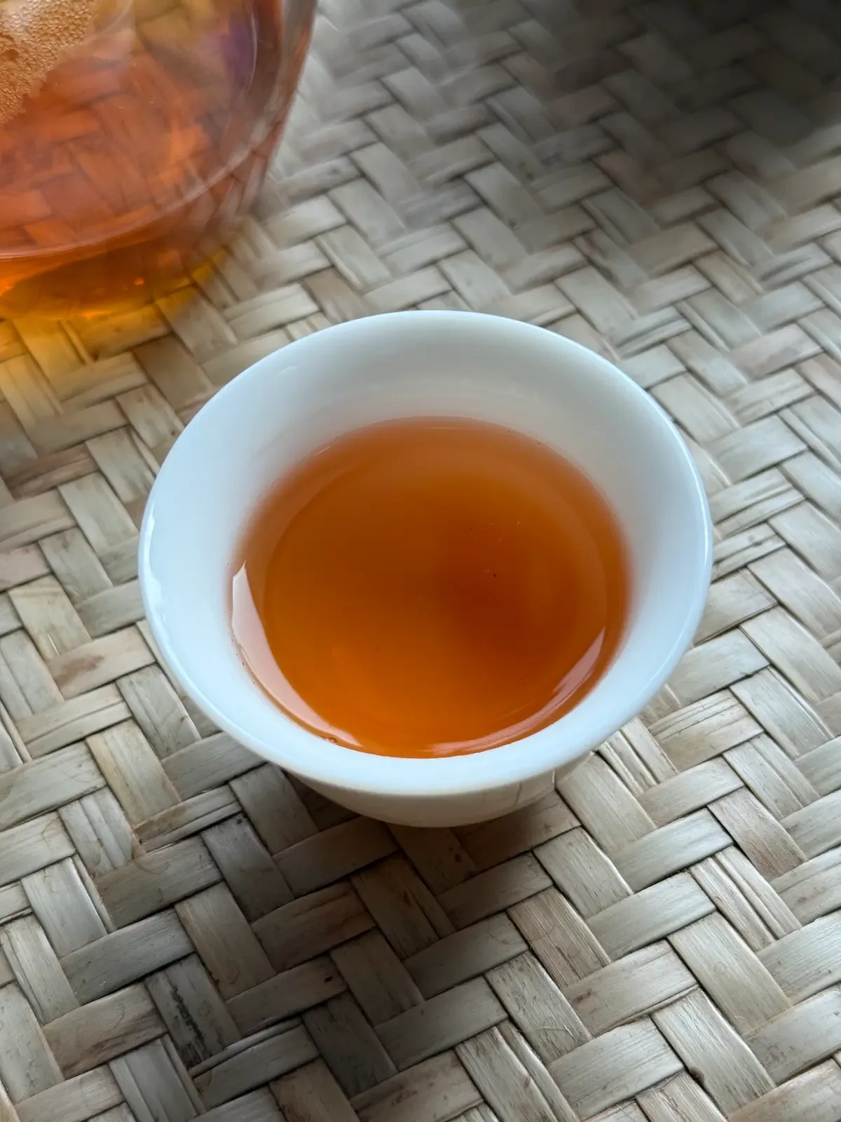 Early steep liquor — clear amber-orange, clean and bright